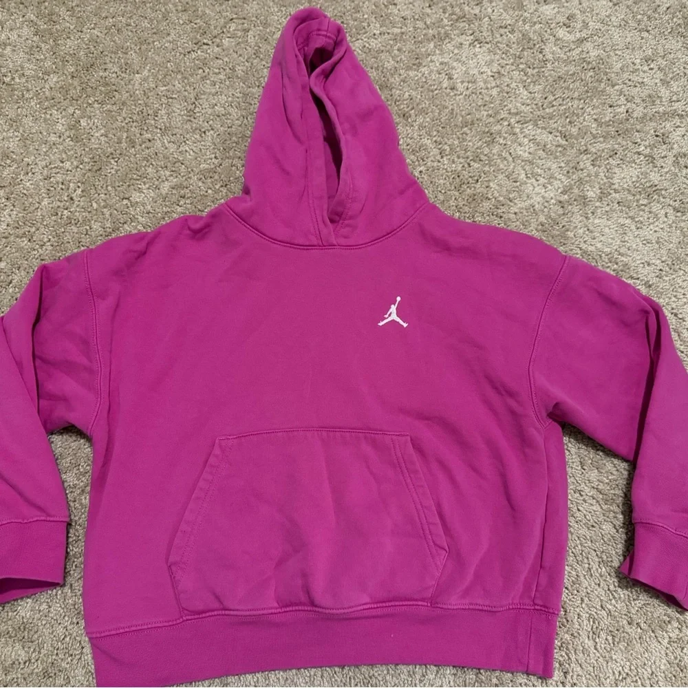 Jordan Big Girls' Brooklyn Essentials Hoodie in a pink/fuchsia color size 12-13